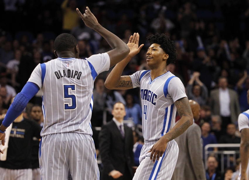 Jan 14, 2015; Orlando, FL, USA; Orlando Magic guard Victor Oladipo (5) and guard Elfrid Payton (4) high five after Oladipo dunked against the Houston Rockets during the second half at Amway Center. Orlando Magic defeated the Houston Rockets 120-113. Mandatory Credit: Kim Klement-USA TODAY Sports